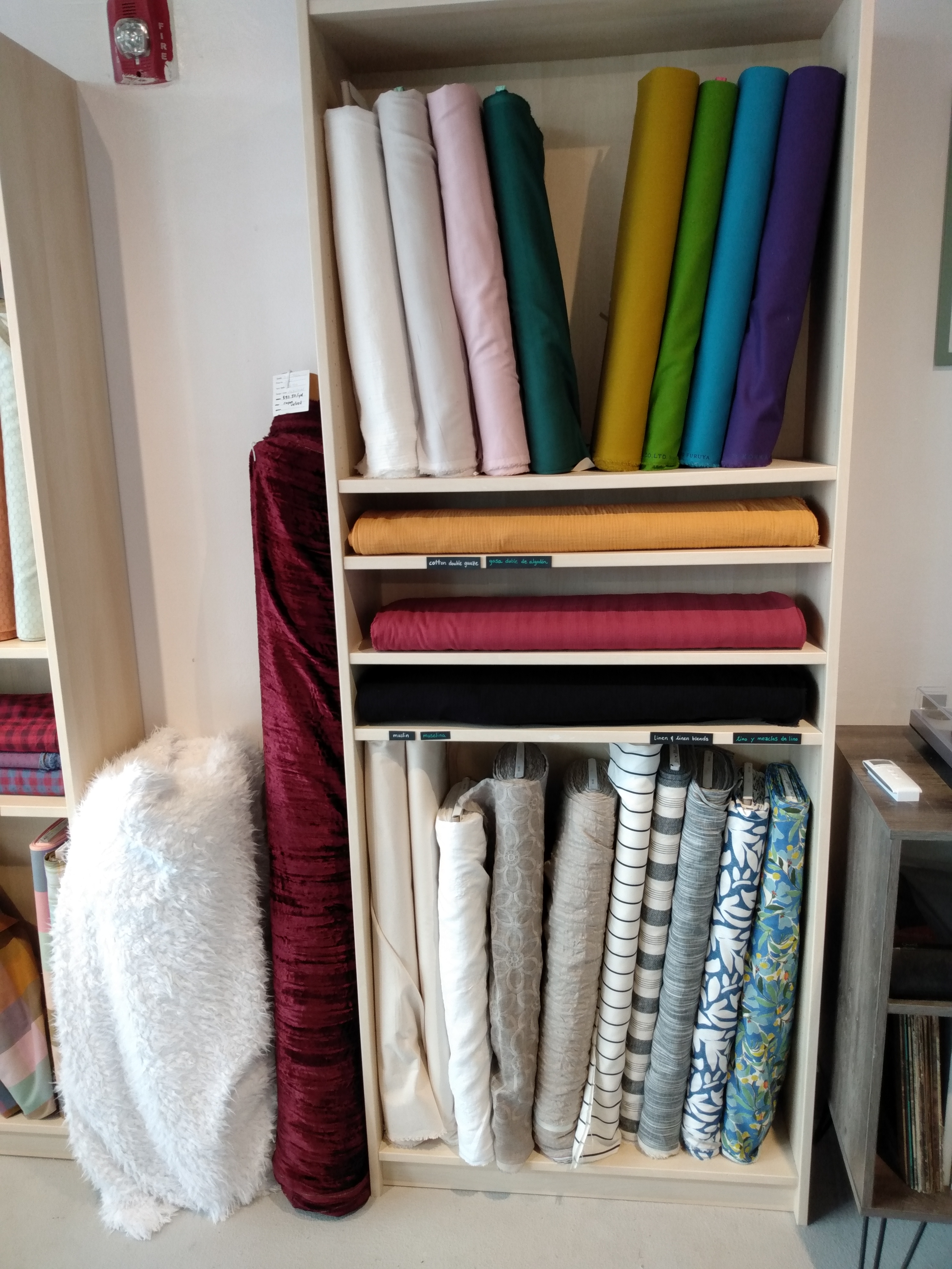 Cotton, linen, and linen blends. A bit of rayon velvet and faux fur there on the side.